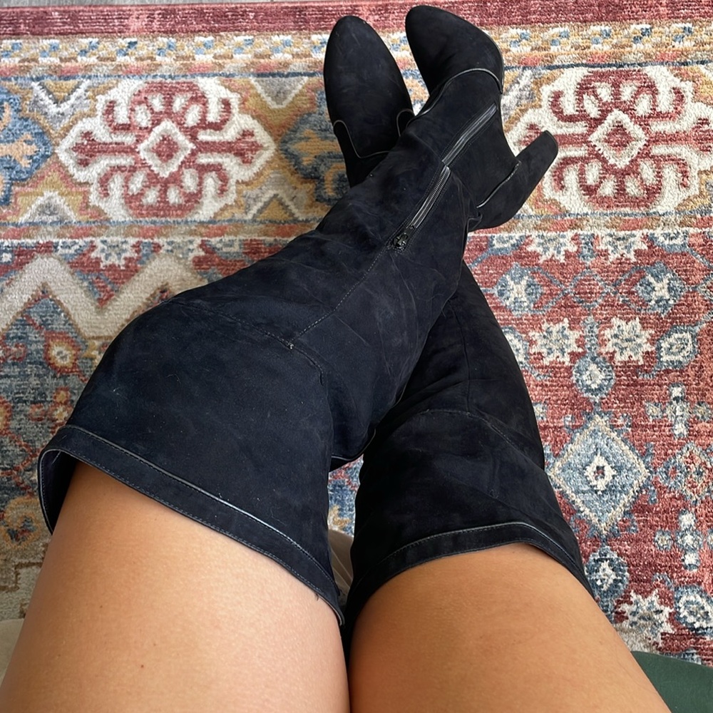 Thigh high black faux suede boots from JustFab. 3.5 inch heels.